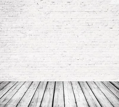 Interior room with white brick wall and wooden floor Stock Photos
