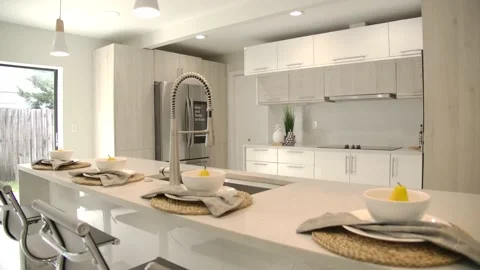 Interior of rooms in a luxury home. Features a kitchen and living room Stock Footage 207533435