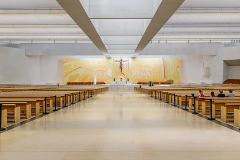 Interior rows of benches inside the Most Holy Trinity Basilica Stock Photos