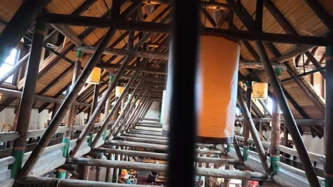 Interior of rustic lodge with hanging lanterns and wooden beams Stock Footage 339117867