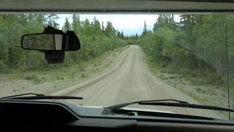 Interior RV Driving POV Dirt Road Highway Mountains Yukon Territory Canada Stock Footage 80768976