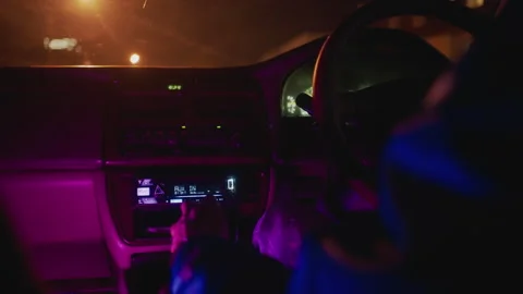 Interior scene of latenight drive with musical and neon effects, Smooth late Stockbeeldmateriaal 324951279