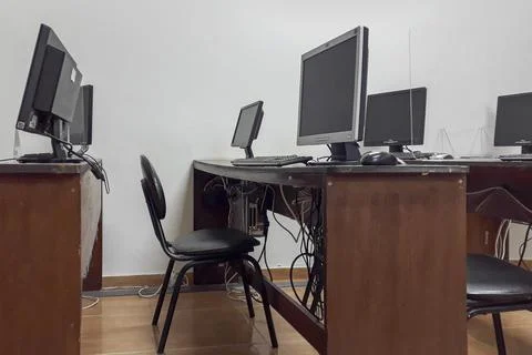 Interior scene of neglected empty computer classroom Stock Photos