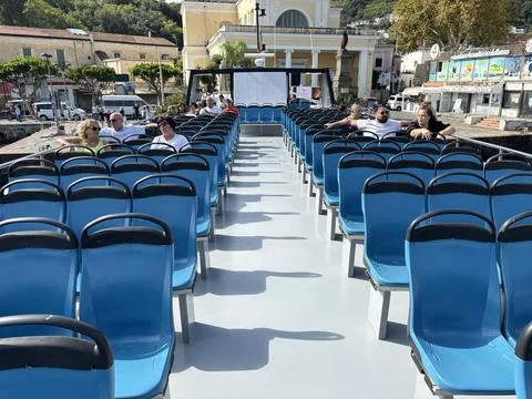Interior seating area inside an Italian passenger ferry ship Foto stock