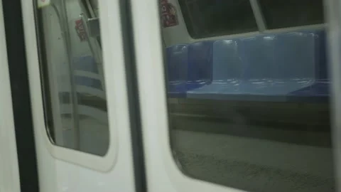 An interior selected focus view at window on subway's door, view of the doo.. Stock Footage 237427699