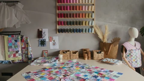 Interior of Sewing Workshop with Patchwork Quilt Design on Table 스톡 동영상 315767523