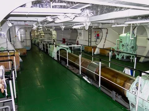 Interior of a Ship's Engine Room with Propulsion Shaft and Machinery Stock Photos