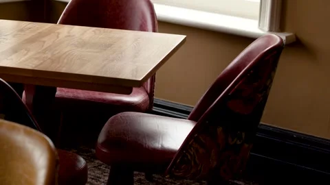 Interior shot of dining chairs and table in restaurant cozy atmosphere. Stock Footage 333936162