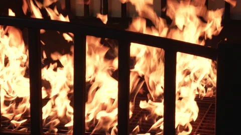 Interior shot of a house on fire, with burning bed Stock Footage 232643899