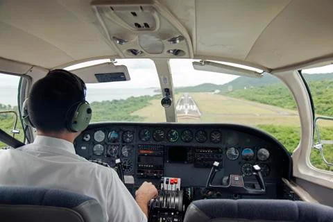 Interior shot of a plane cockpit landing Stock Photos