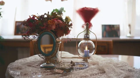 Interior shot of small boudoir dressing table with small mirror and flowers Stock Footage 186967146