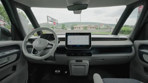 Interior Shot of VW ID. Buzz Modern Electric Vehicle Cabin with Futuristic Vidéo 331094782
