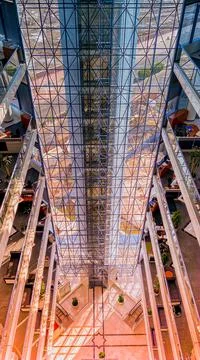 Interior of a skyscrapper building, Sun rays inside the building Stock Photos