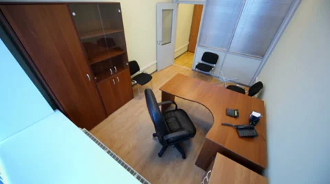 Interior of small empty cabinet with office furniture Video stock 33295565