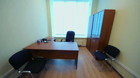 Interior of small empty room with office furniture and window Video stock 33295554