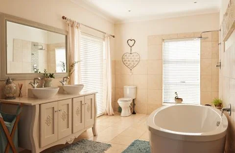 Interior of a spacious classically styled bathroom Stock Photos