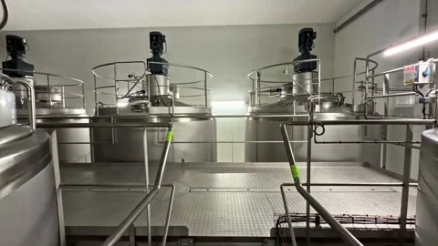 Interior Stainless Steel Tanks In Processing Facility Video stock 333311485