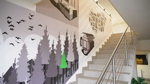 Interior staircase decorating with graphics depicting nature and knowledge Stock Footage 339927400