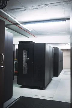 Interior, storage and servers in empty data center for cybersecurity, IT ha.. Stock Photos