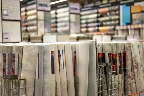 Interior of the store. large hardware store, tools and material. section with Stock Photos