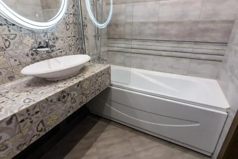 The interior of a stylish compact bathroom Stock Photos