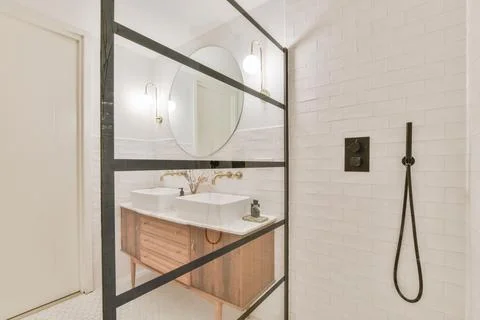 Interior of stylish light bathroom Stock Photos