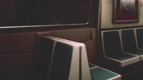 Interior of a subway train showing empty seats during evening hours Stock Footage 342049719