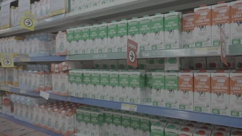 The interior of a supermarket and the dairy section in Buenos Aires, Argentina Stock Footage 345142286