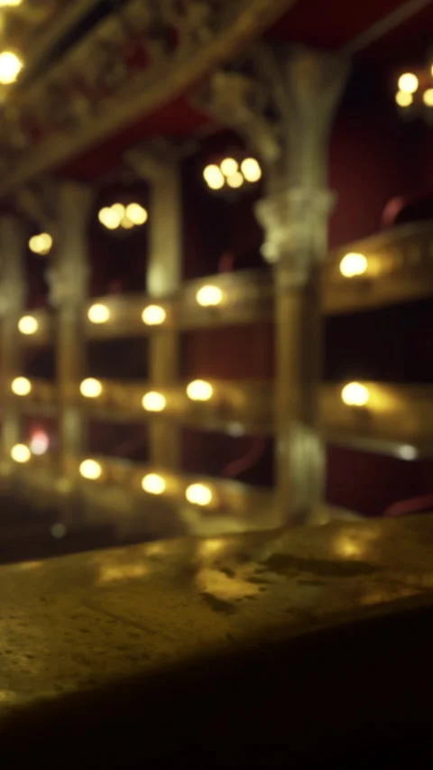 Interior of a theater with lights and decor visible at night Stock Footage 332208279