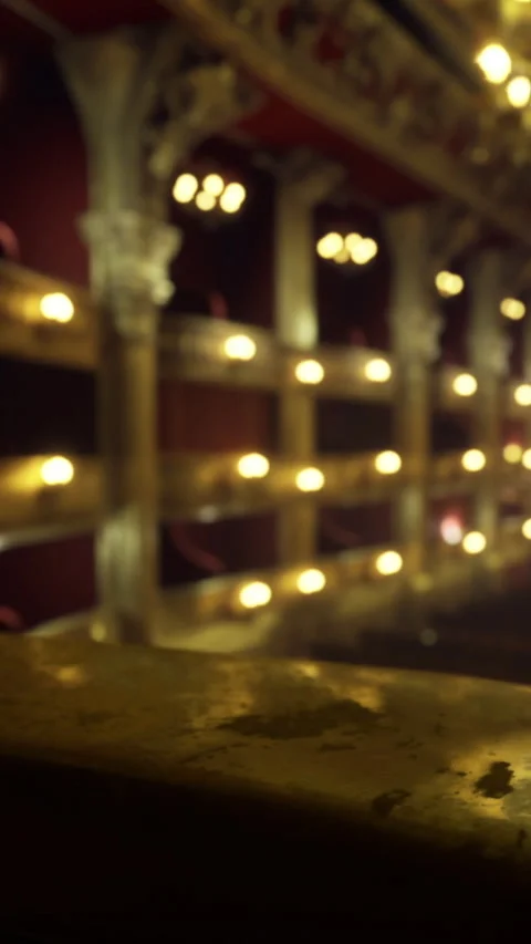 Interior of a theater with lights turned on during an evening show Stock Footage 334175305