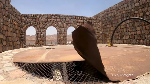 Interior of Traditional Stone Well Structure with Desert View Vídeo Stock 321158215