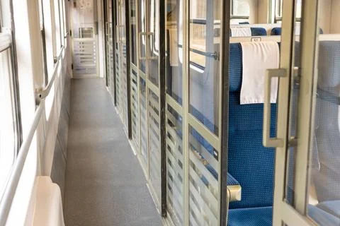 Interior of a train carriage. Empty compartments, Rail transport.  Stock Photos