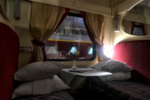 Interior of the train inside the sleeping car. Stock Photos