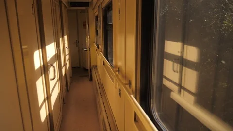Interior of train railroad car sunlight compartment with night corridor before Video stock 94687119