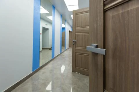 Interior of typical office - empty corridor - without furniture after Stock Photos