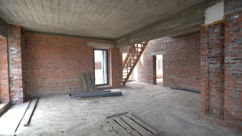 Interior of the unfinished building of the room. Construction of brick and Stock Footage 161822927