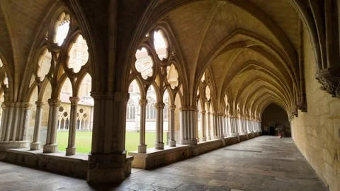 Interior vaulted stone corridors of the gothic cloister at the Cathedral Video stock 339129912