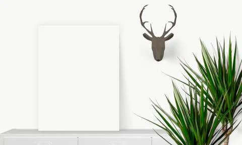 Interior vertical rectangular poster mockup standing on the table with plant  Stock Photos