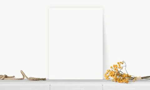 Interior vertical rectangular poster mockup standing on the table with plant  Foto stock