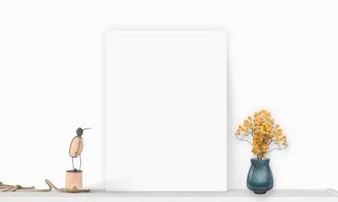 Interior vertical rectangular poster mockup standing on the table with plant  Stock Photos
