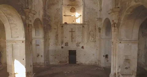 Interior view of abandoned and damaged Church shooting drone Stock Footage 117174860