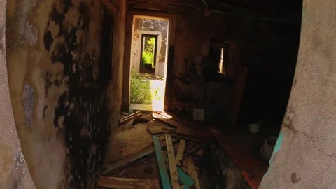Interior view in an abandoned building with brick concrete stone house wall and  Stock Footage 242330664