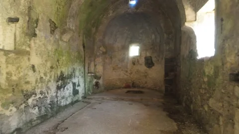 Interior View of Abandoned Stone House with Natural Lighting Stock Footage 338203085