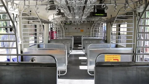 Interior view of an almost empty Mumbai Local Train in motion Stock Footage 170892964