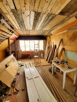 Interior view of the attic house under construction. Renovation in the attic of Stock Photos