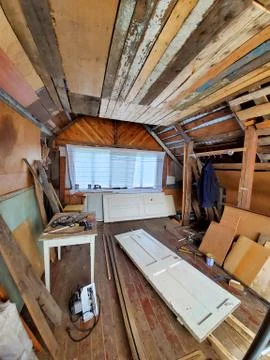 Interior view of the attic house under construction. Renovation in the attic of Stock Photos