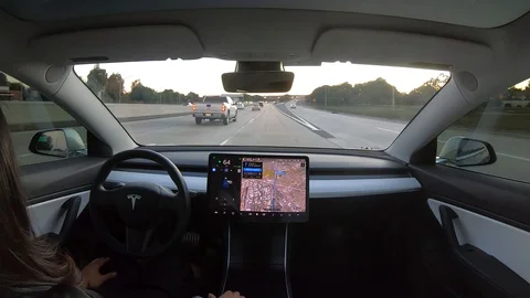 Interior view of autonomous car or EV in full self driving autopilot mode Stock Footage 118803354