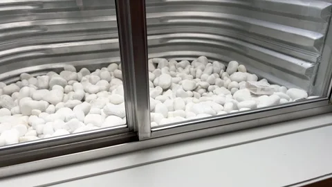 Interior View of Basement Window with Rocks Stock Footage 316310808