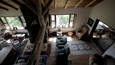 Interior view of a beautiful and comfortable log cabin with a fireplace in Stock Footage 158807169