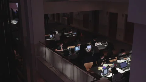 Interior view of the British Library visitors studying and reading Stock Footage 146291217